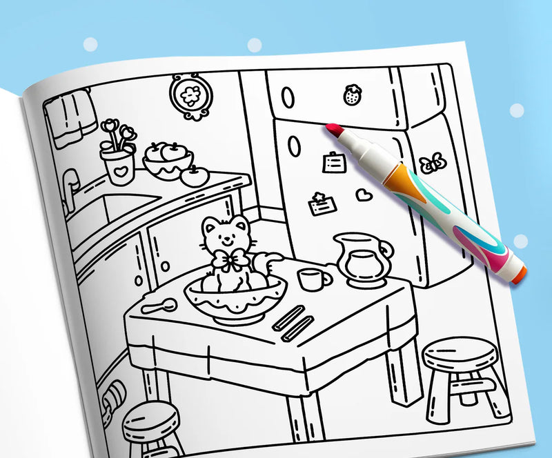 Open book: a kitten sitting in a bowl on the kitchen table