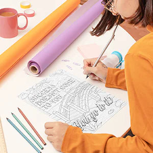 A woman colors the quote Success doesn’t come to you, you go to it.