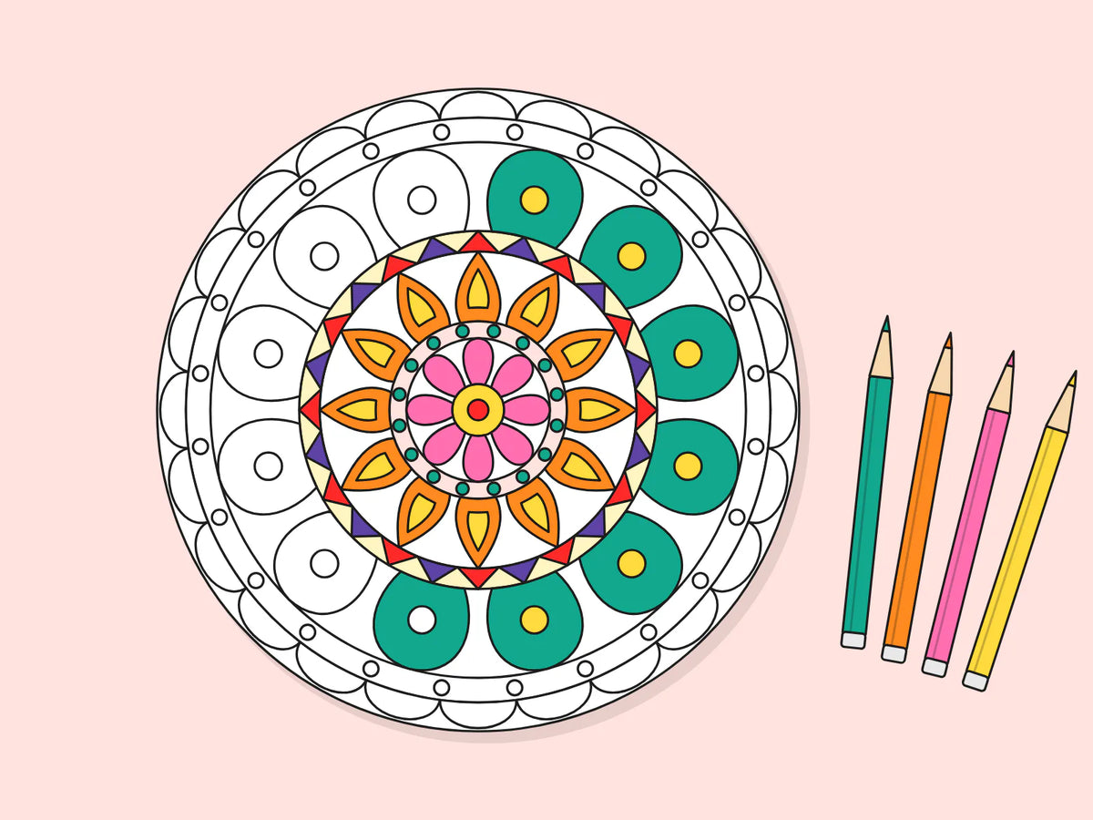 A mandala colored from the center out, the outer ring half done, with four colored pencils beside the page