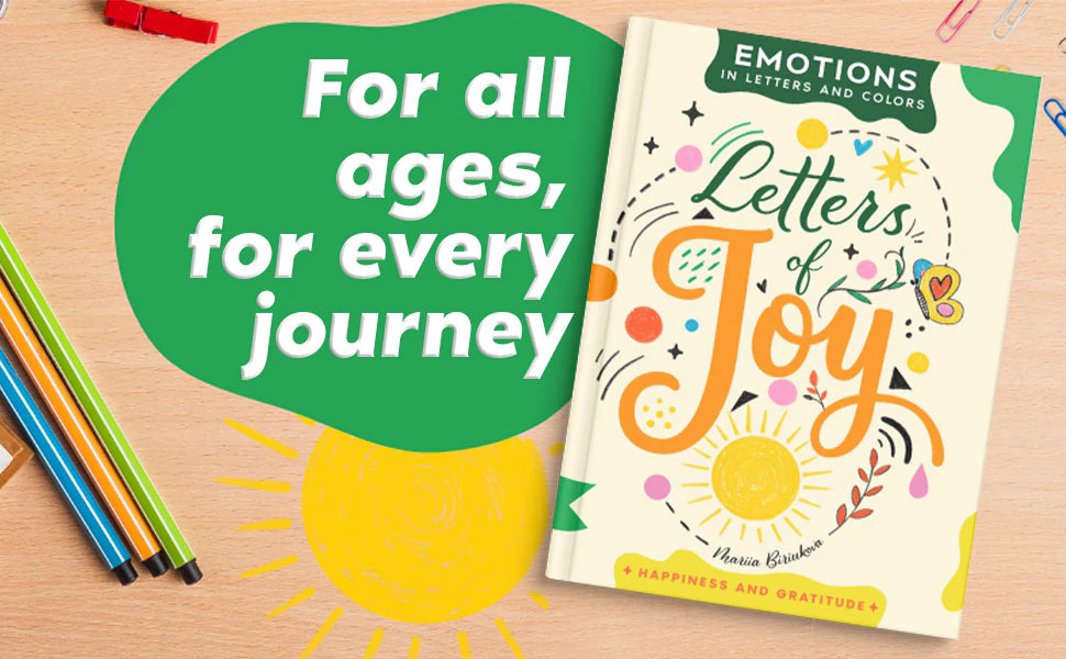 Letters of Joy by Mariia Biriukova on a wooden desk with markers and a hand-colored sun: For all ages, for every journey.