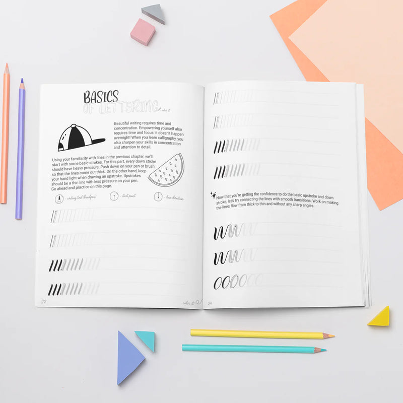 Letters of Empowerment open at the Basics pages, with stroke practice and colored pencils.