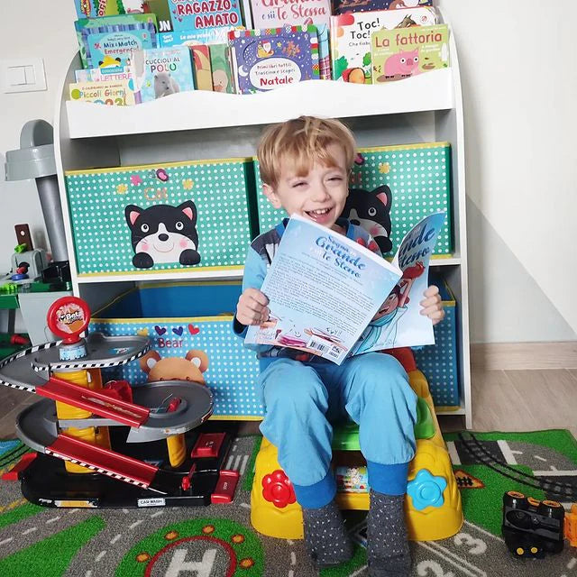 A boy reading Sogna in Grande e Sii Te Stesso in front of a bookcase
