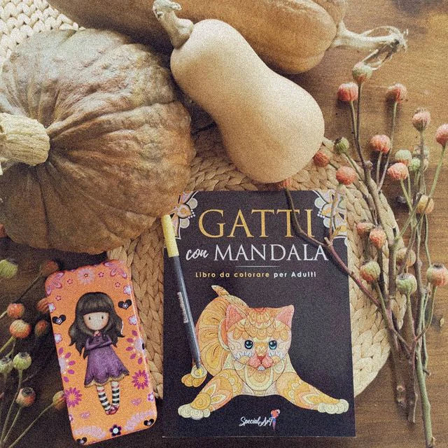 The coloring book Gatti con Mandala with pumpkins and dried flowers